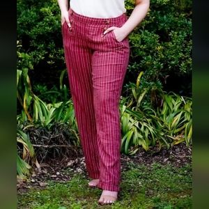 Flowy Stripped paints boot cut with button detail